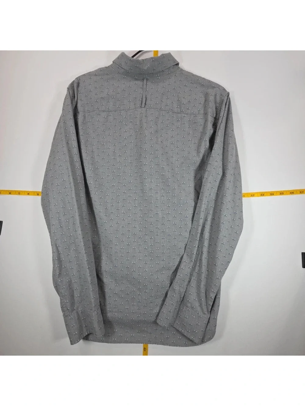 Banana Republic all-over grey raccoon face print.